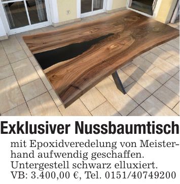 Exklusiver Nussbaumtischmit Epoxidveredelung von Meisterhand aufwendig geschaffen.Untergestell schwarz elluxiert. VB: 3.400,00 €, Tel. ***